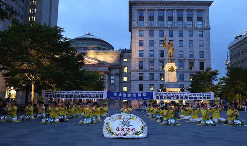 Image for article Rapat Umum dan Nyala Lilin di Montreal Memperingati 20 Tahun Perlawanan Falun Gong terhadap Penganiayaan