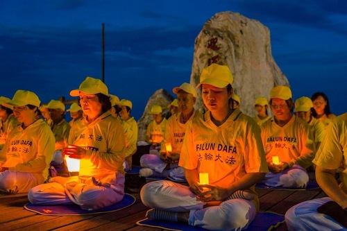 Image for article Taiwan dan Makau: Nyala Lilin Menandai 20 Tahun Penganiayaan