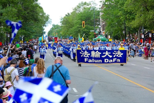 Image for article Praktisi Falun Gong Memeriahkan Pawai Hari Kemerdekaan di Quebec