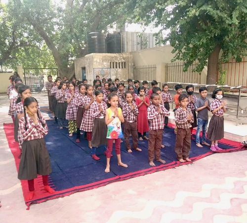 Image for article Delhi, India: Anak-anak Sekolah Senang Mempelajari Latihan Falun Dafa