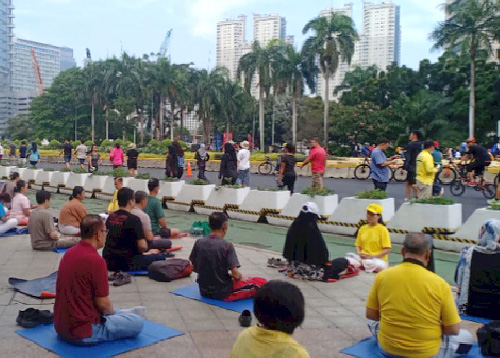 Image for article Jakarta Gelar Hari Bebas Kendaraan, Publik Belajar Latihan Falun Dafa