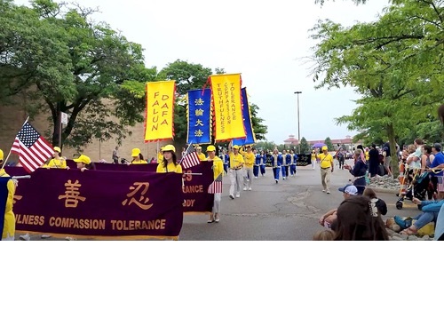 Image for article Michigan, AS: Falun Dafa Diterima dengan Hangat di Pawai Empat Juli Ann Arbor