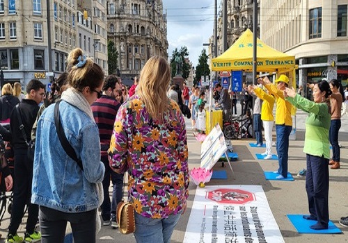 Image for article Belgia: Memperkenalkan Falun Dafa dalam Event di Antwerpen