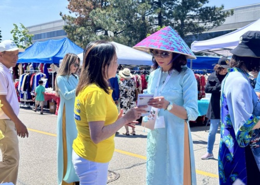 Image for article Kanada: Warga Dapat Belajar Falun Dafa Selama Acara Peringatan Taman Saigon