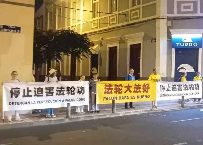 Image for article Spanyol: Polisi Lindungi Aksi Damai Kelompok Falun Dafa di Depan Hotel Pemimpin Tiongkok Xi Jinping