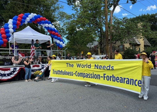 Image for article Maryland, AS: Masyarakat Menunjukkan Dukungan untuk Falun Dafa di Perayaan Hari Buruh